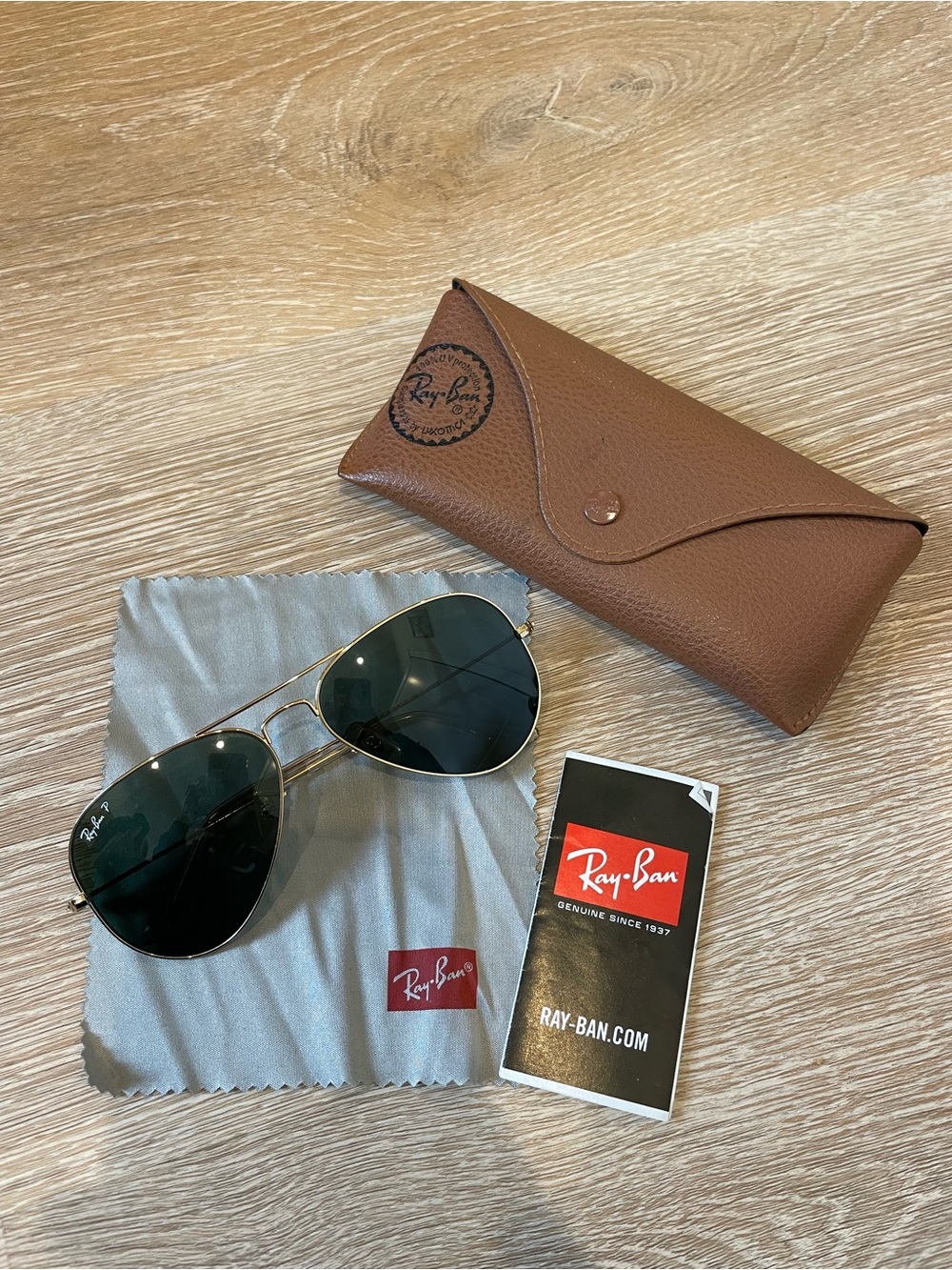 Ray-Ban Gold Frame Sunglasses with Black Polarized Lenses